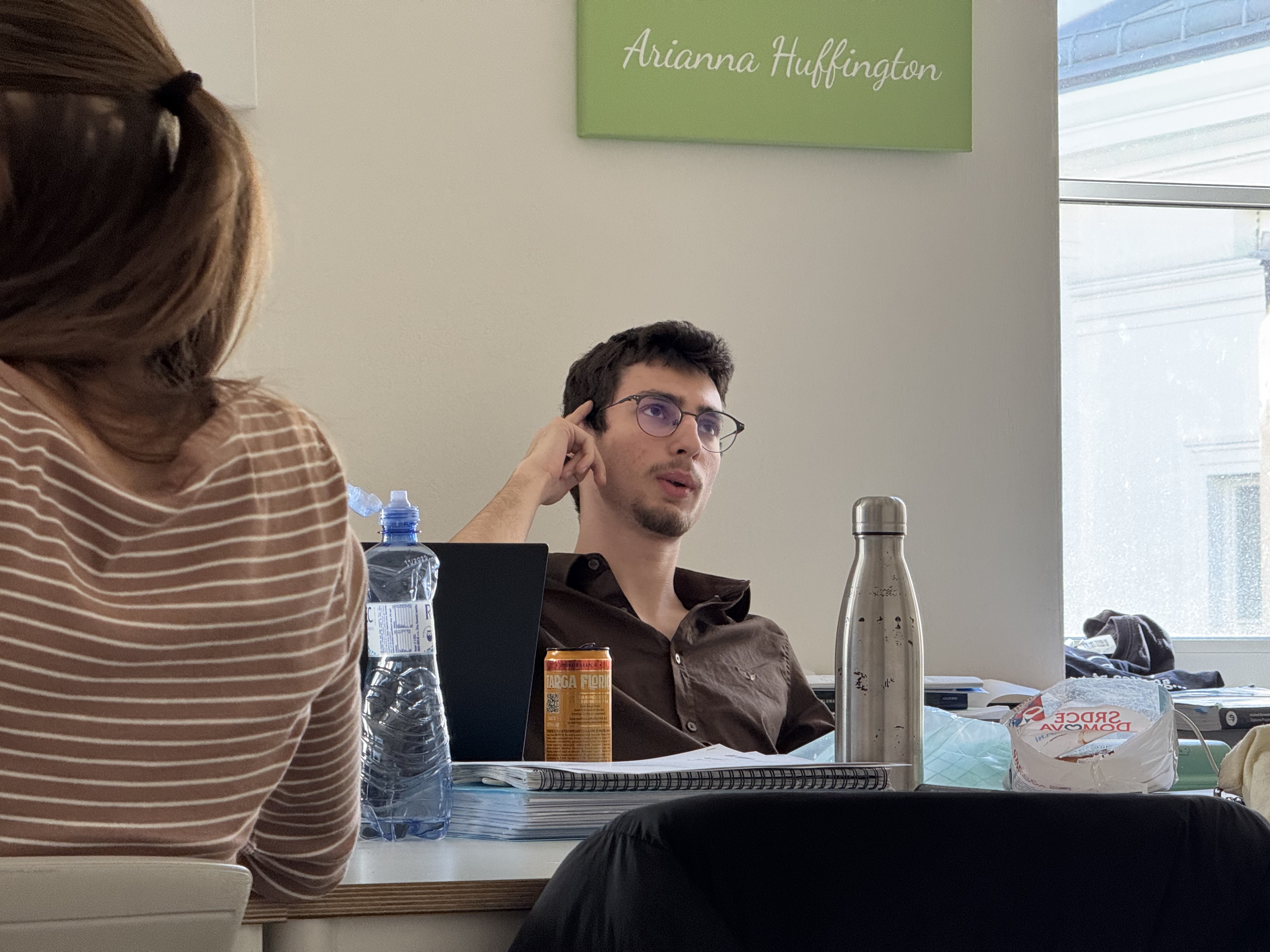 Graduates in front of a university building