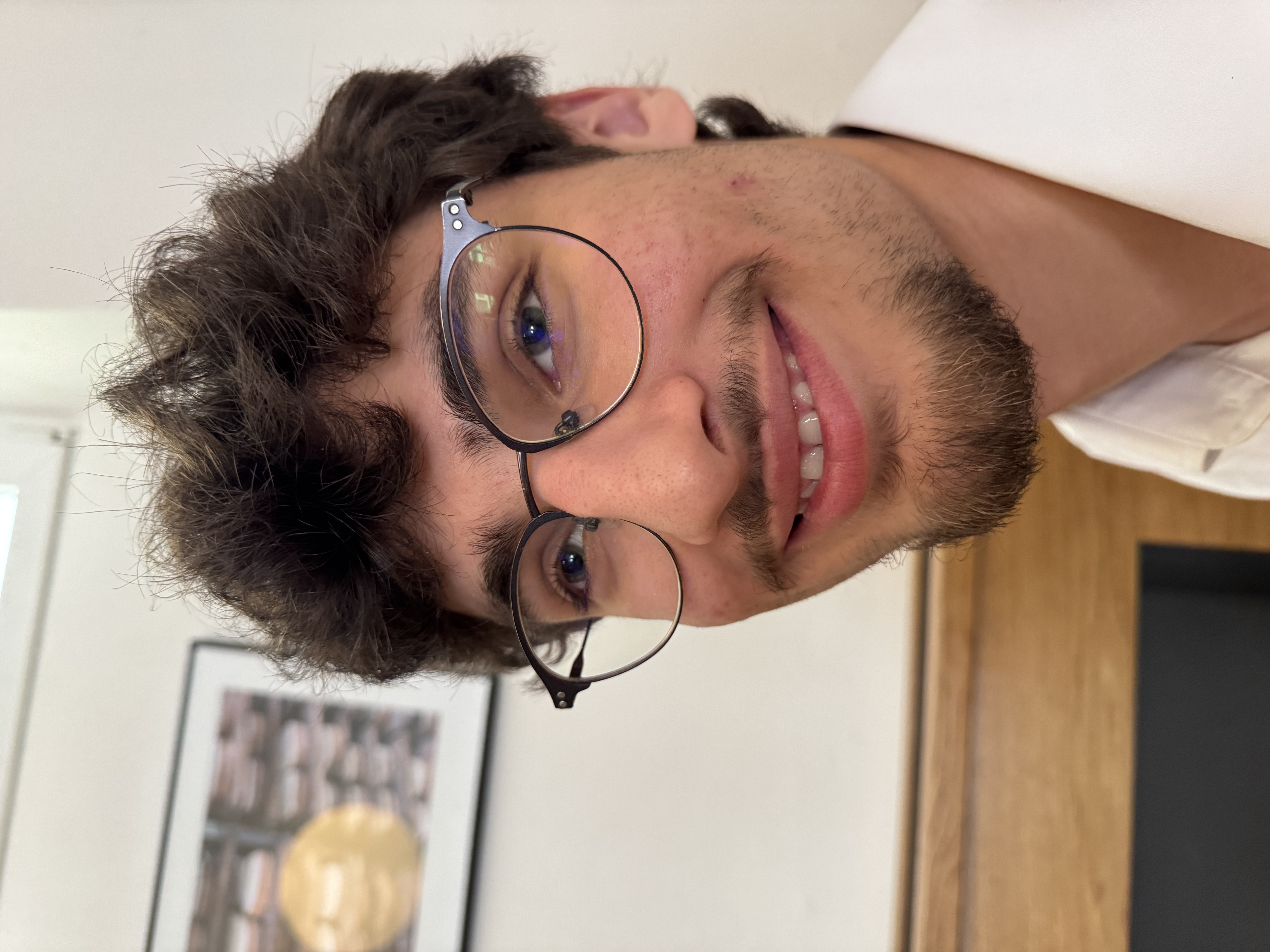 Graduates in front of a university building